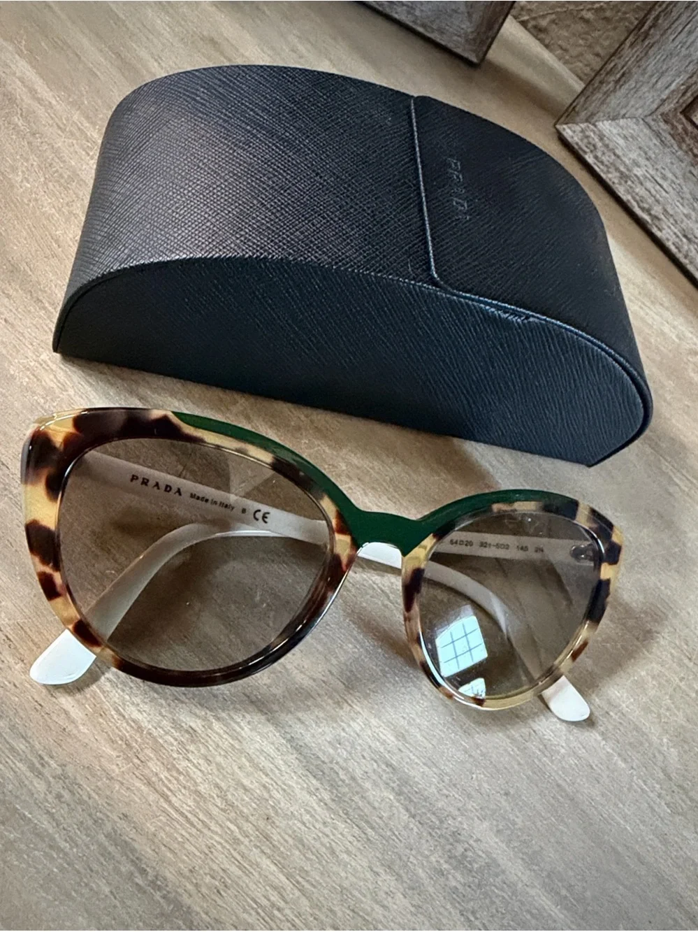 Prada White Tortoiseshell Sunnies  . Excellent cond. w/ case